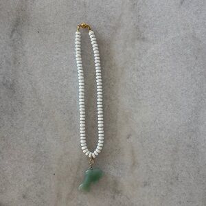 Notte beaded necklace with hand-carved jade dolphin pendant